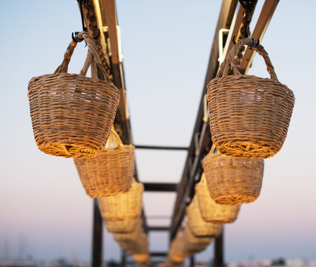 Conveyor belt with baskets in seaport.