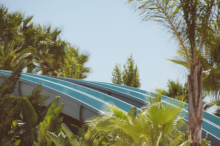 Plastic water-slides in amusement park.