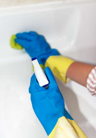 House cleaning. Woman cleaning a bath.の写真素材