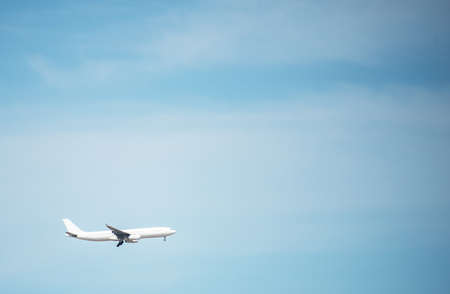 Plane in the sky. Place for your text.の写真素材