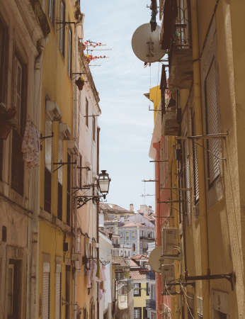 Beautiful narrow old street in Lisbon.の写真素材