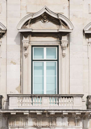 Facade of old apartment building with balcony.の写真素材