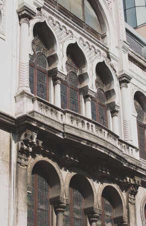 Facade of old apartment building with balconies.の写真素材