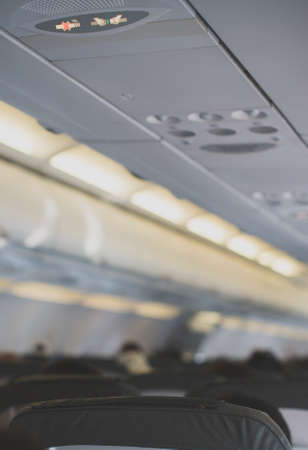 Interior inside of the plane with passengers.の写真素材
