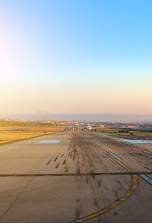 Planes on airport runway in the morning.のeditorial素材