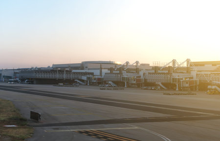 Airport terminal docks at morning sunrise.のeditorial素材