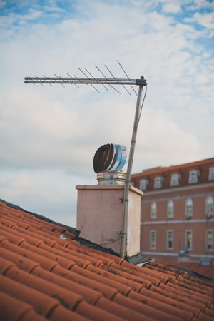 TV antenna and ventilation on the roof of the old house.