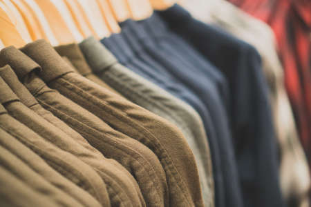 Men's warm shirts in a clothing store.の写真素材