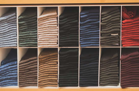 Shelves with different socks in a clothing store.の写真素材