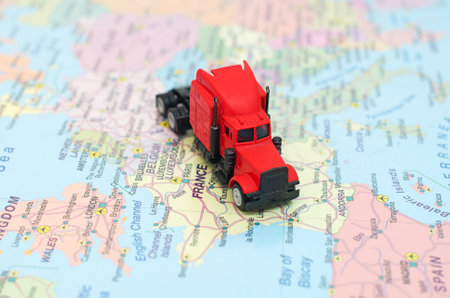 Concept of cargo transportation. The truck is on the map in France.のeditorial素材
