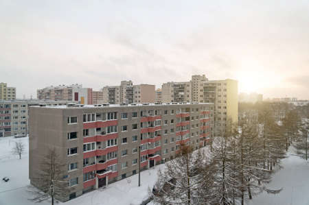 Sunset in the snowy weather on Katleri Street, Lasnamae, Tallinn.の写真素材