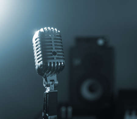 Retro microphone in home music studio.の写真素材