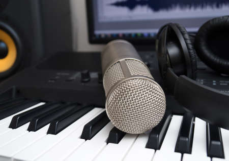 Mixer, condenser microphone and professional monitor. Concept of home music studio.の写真素材