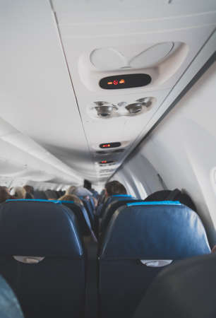 Interior inside of the plane with passengers.の写真素材