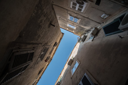 Building architecture in old town of Split. Rooftops with communications.の写真素材