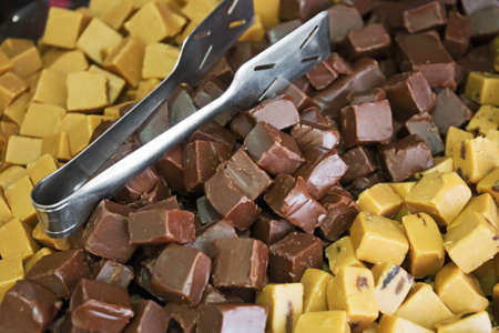 White and brown milk chocolate in the shop.の写真素材