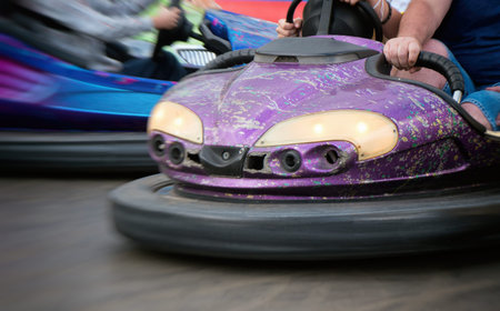 Electric bumper cars in amusement park.