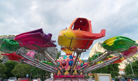 Colorful carousel in the amusement park.のeditorial素材