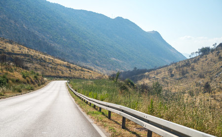 Empty asphalt road in the mountains.