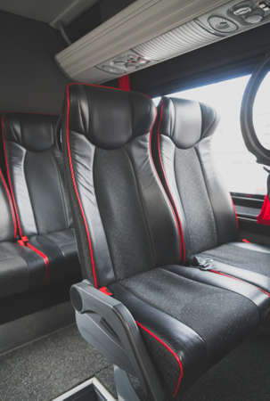 Seats in the cabin of a modern minibus.の写真素材