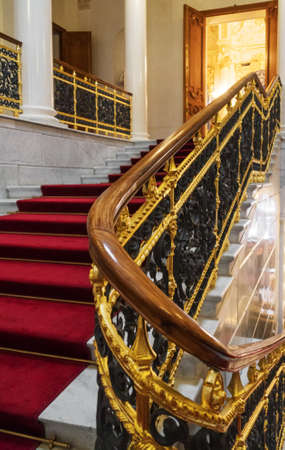 Staircase and red carpet in the palace.の写真素材