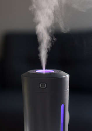 Vapor coming from electric air humidifier.の写真素材