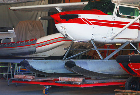 Close-up view of floatplanes (seaplanes) standing in hangar.