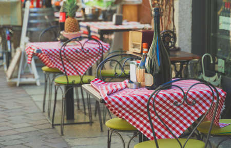 Outdoor cafe terrace exterior with table and chairs.の写真素材