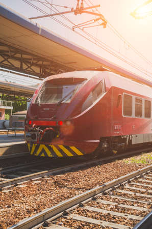 Train in railroad station in Northern Italy.の写真素材