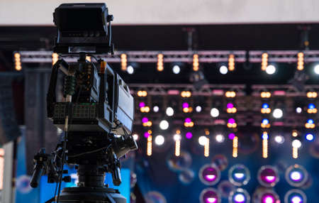 Professional video camera is ready to shoot the concert.の写真素材