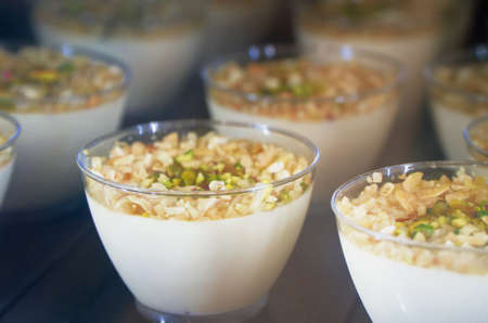 Close-up view of Creamy dessert with nuts.の写真素材