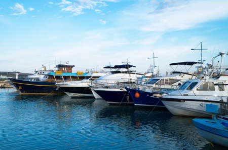 Many yachts and boats in the harbor.の写真素材
