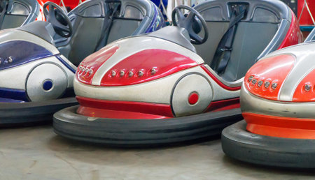 Bumper cars in the city amusement park at evening.の写真素材