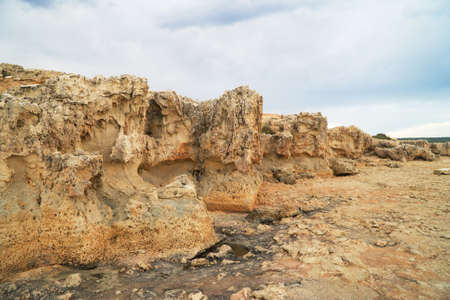 Beautiful lava stones on the Cyprus seashore.の写真素材