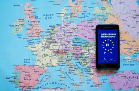 Phone with European Immunity passport app. Travel during Covid-19 concept.の写真素材