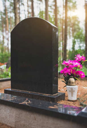 Memorial stone in the forest cemetery.の写真素材