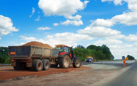 Heavy equipment works in the air. Road reconstruction
