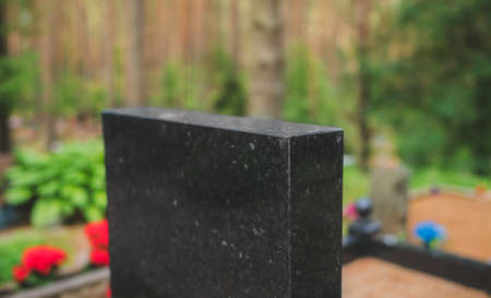 Memorial stone in the forest cemetery.の写真素材