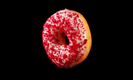 Flying pink glazed donut with sprinkles.の写真素材