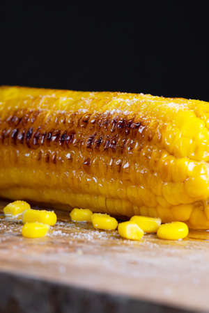 Macro view of freshly cooked corn in oil.の写真素材