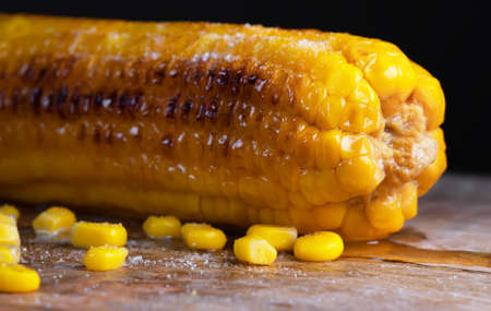 Macro view of freshly cooked corn in oil.の写真素材