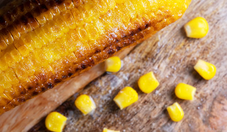 Macro view of freshly cooked corn in oil.