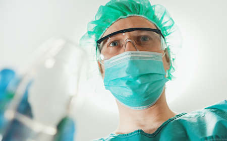 Legs on the scales. Man checking his weight.の写真素材