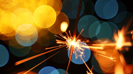 Bengal fire on a festive bokeh background.