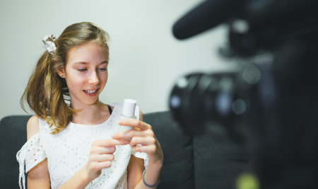 Teenage girl making video blog about skincare. Vlog concept.の写真素材