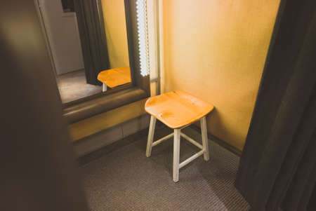 Clothing store changing room with mirror.の写真素材