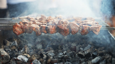 Grilled beef shashlik on skewers. Street food.の写真素材