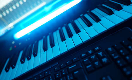 Professional midi keyboard synthesizer in record studio.の写真素材