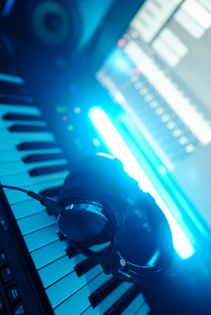 Headphones on the piano keyboard. Recording studio concept.の写真素材