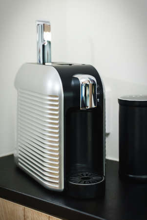 Capsule coffee machine on the table.の写真素材